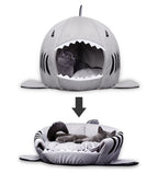 Shark pet bed shown as an enclosed cave and as an open lounger