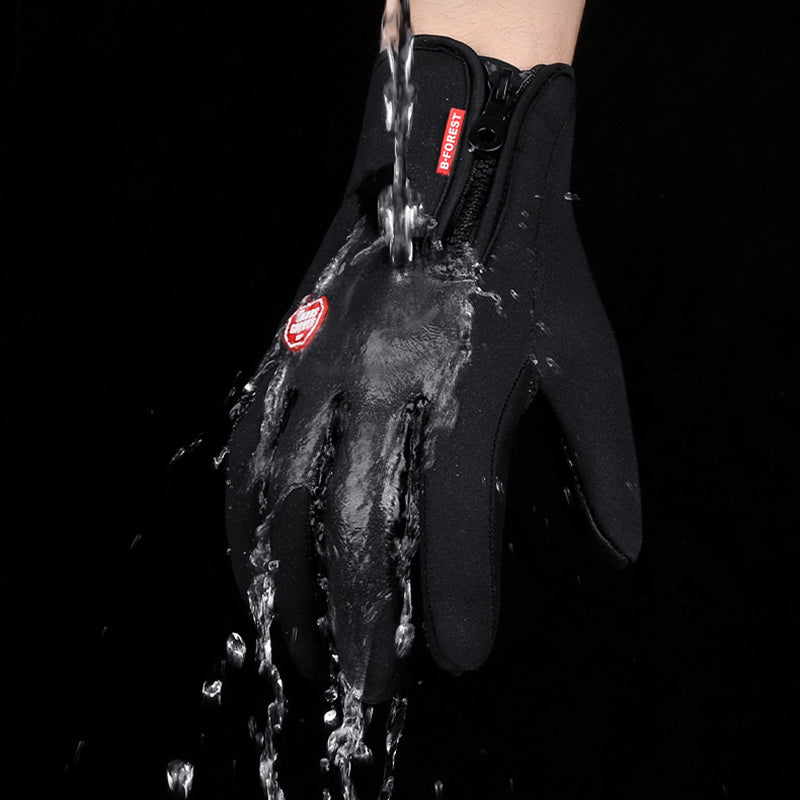 Black winter glove with water poured over it to demonstrate water resistance