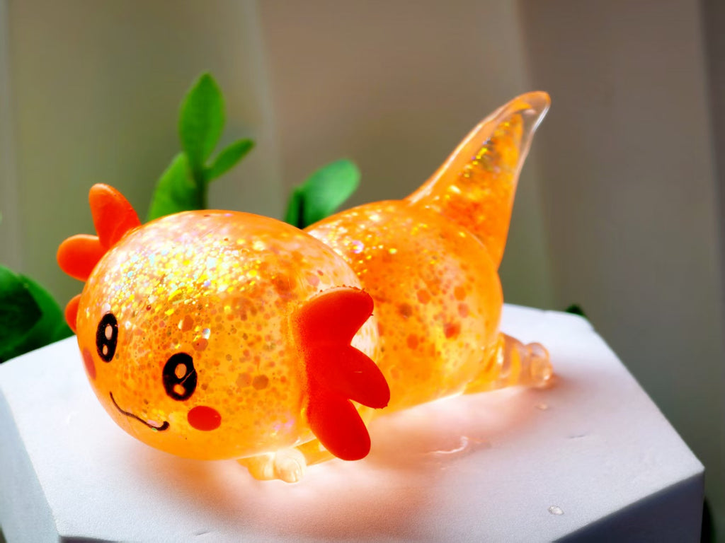 Squishy Fidget Toy – Fun Squeeze Toy in Cute Designs – Lying Axolotl – Orange