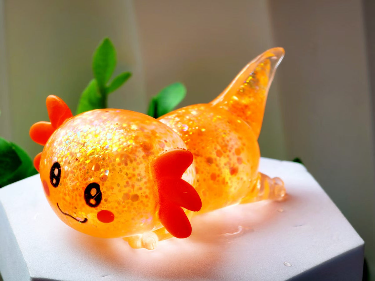 Squishy Fidget Toy – Fun Squeeze Toy in Cute Designs – Lying Axolotl – Orange