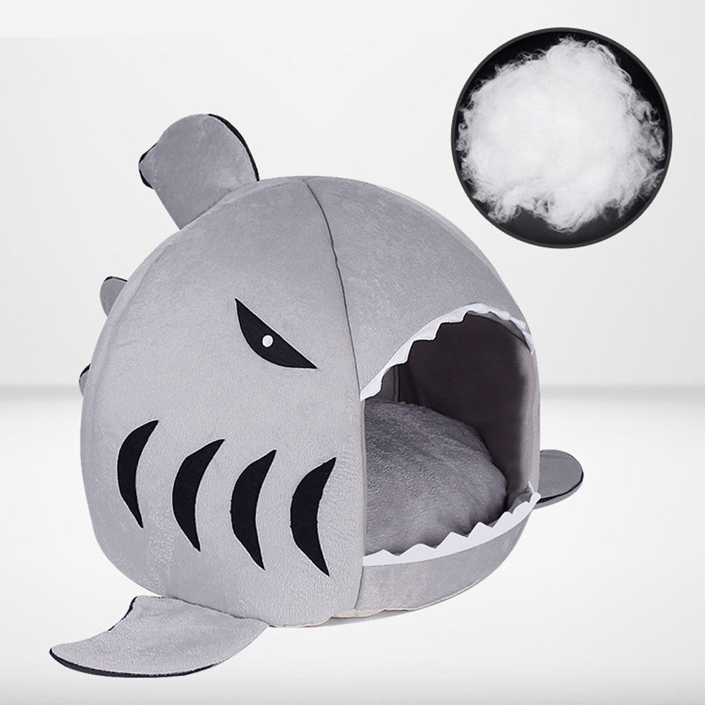 Empty shark-shaped pet bed with soft cotton filling