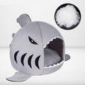 Empty shark-shaped pet bed with soft cotton filling