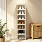 White 8 tier metal shoe rack filled with shoes in an entryway