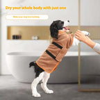 Dog wearing a pet bathrobe drying towel