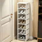 White 8 tier shoe rack standing next to a door